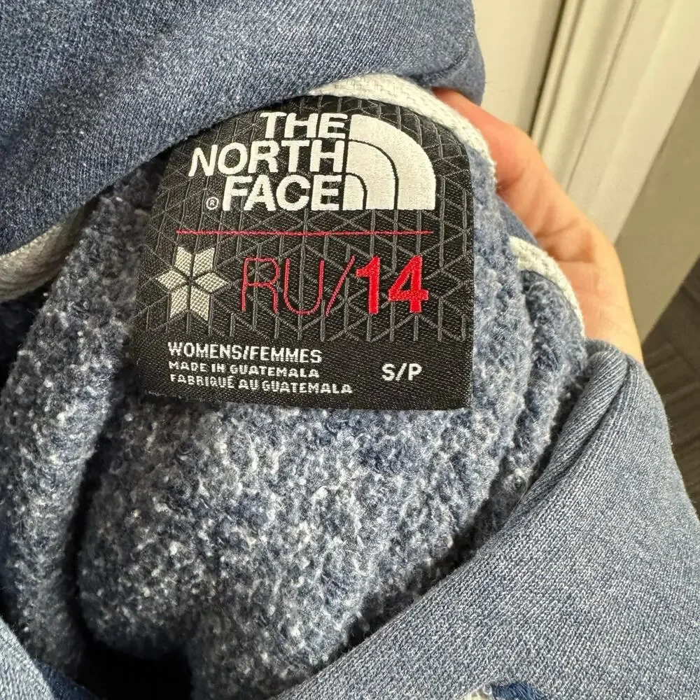 The North Face RU14 medium weight light blue graphic hooded sweatshirt